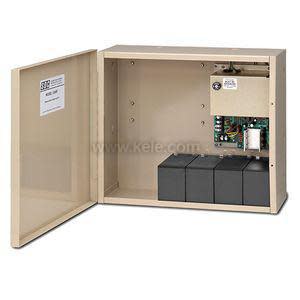 Light tan metal box with a hinged door, showing a small power board in the top right and four blocky black batteries in the bottom