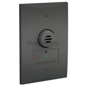 Small square black plate with horizontal vent slots and tiny green indicator light.