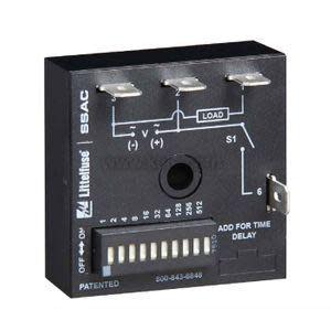 Small rectangular module with a printed label, adjustable switches and screw terminals