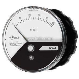 Circular air pressure gauge showing mbar scale, with a sweeping needle across a white and black dial