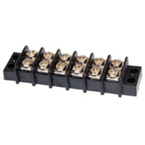 A small black plastic terminal strip with eight shiny metal screw terminals arranged in four pairs, each pair separated by a raised divider; there are mounting holes at each end.