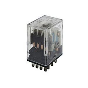 Small clear relay cube showing inner parts, mounted on a black base with many pins.