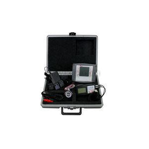 Black carrying case with various instruments and sensors, including digital meter and probes