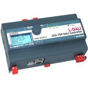 Blue electronic controller with mini screen, dial, and red foot clips.