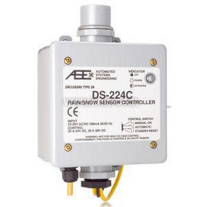 Black rectangular control box with small display and text-labeled keypad.