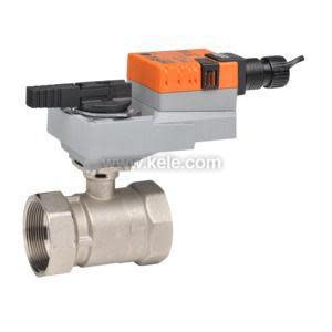 Small metal ball valve with orange actuator and black lever handle on top.