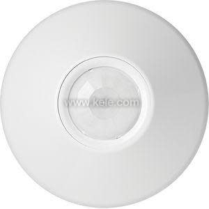 Round white ceiling sensor with a domed lens and small switches