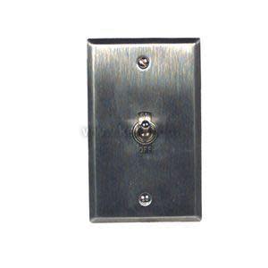 Metal wall plate with protruding toggle lever and engraved text.