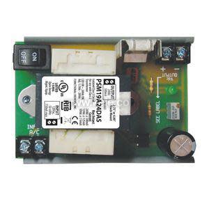 Rectangular circuit board with various electronic components: black rocker switch, white relay, fuse, terminals and capacitor