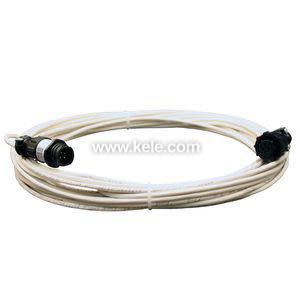 Long white sensor cable coiled neatly with black round connectors on each end for leak detection