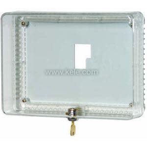 Transparent plastic box with hinged door and small round lock at the top.