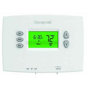 A white Honeywell thermostat featuring a green LCD screen showing time and temperature, with up/down arrow keys and three buttons labelled Set, Hold, and Run.