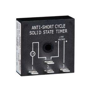 Black square timer module with printed diagram and three metal tabs.