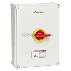 A rectangular light gray box with a circular yellow and red handle used to switch power on or off.