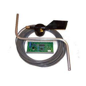 Set of components including a flat brass paddle, coiled cable and small circuit board