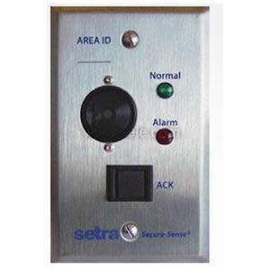 Wall-mounted annunciator plate with sensor lens, green and red LEDs labelled Normal and Alarm, and an ACK button