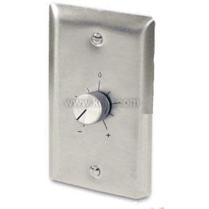 A brushed metal wall plate with a single round knob in the center, marked with minus and plus symbols for adjusting a setting.