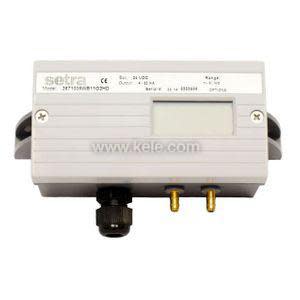 Rectangular grey sensor with small display window, two brass ports and black cable gland.