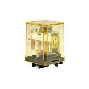 Small cube-shaped relay encased in transparent amber plastic, showing a yellow coil and metal contacts on a black base.