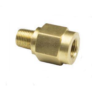 Small hexagonal brass fitting with threaded stud on one end and an internal threaded opening on the other.