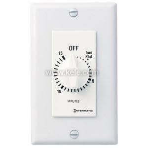 A white rectangular plate with a rotary timer knob showing 0–15 minutes and off at the top.