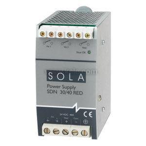 photograph of a gray Sola SDN 30/40&nbsp;RED power supply module with screw terminal connectors at the top and bottom, labeled 24&nbsp;VDC 4&nbsp;A