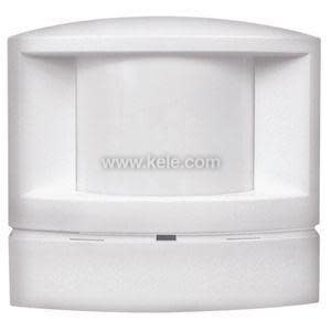 White motion sensor with curved top and large clear lens across the front