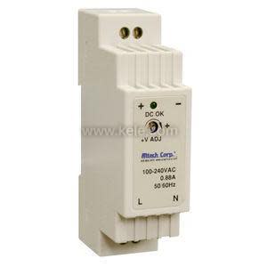 Tall narrow cream power supply with ridged sides, a green indicator light and a small adjustment dial on the front