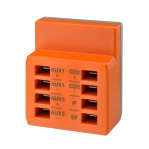 Orange expansion module with rows of plug-in ports labeled AUX and CO2