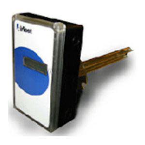 A small rectangular device with a white face and blue circle, narrow screen and a long golden metal prong for mounting.