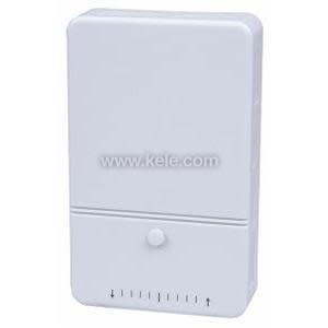 Wall setpoint adjuster with black knob.