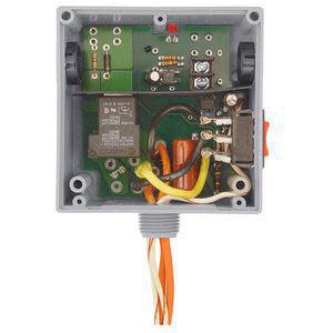 small square enclosure with the front removed, exposing electronics and orange and yellow wires