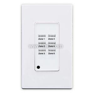 A rectangular white wall-mounted control panel has six small rocker buttons arranged in two columns, each labeled 'Zone 1' through 'Zone 6'; a small round status light sits at the bottom.