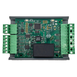 A green circuit board populated with chips and components, with green screw terminals along the edges.