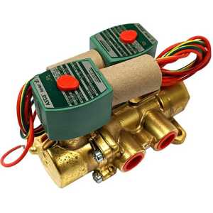 Top view of a gold-colored valve fitted with two green solenoid coils, each with a red manual override, and colourful wires extending from each coil.
