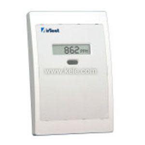 White wall-mounted CO2 sensor with tiny digital screen showing numbers