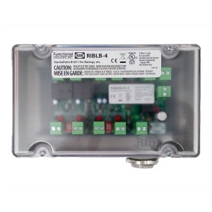 Clear rectangular enclosure housing circuit board with four green terminal blocks and warning label.