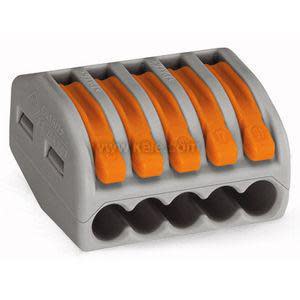 Compact transparent connector block with five orange lever clamps for connecting electrical wires