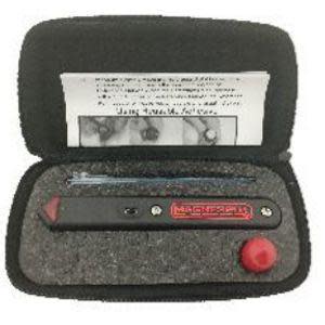 A small black instrument with a red end and a screw inside a gray foam‑lined case, accompanied by a small accessory and an instruction sheet.