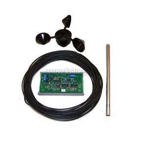 Wind sensing assembly consisting of black three-cup rotor, long metal shaft, coiled cable and green electronics board