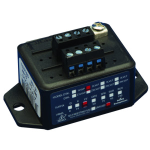 Compact black surge protector with three screw terminals and printed wiring information