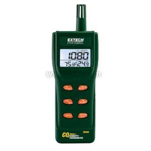 Handheld CO2 meter with green body and orange buttons, display shows 1088.
