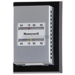 Grey pneumatic thermostat with dual adjustment dials and long copper capillary tube ending in a bulb