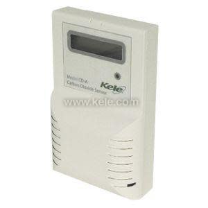 Beige carbon dioxide sensor with small screen at top and vented lower panel