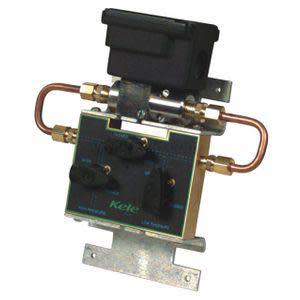 Metal plate mounted with copper tubes, a small circuit board and wiring