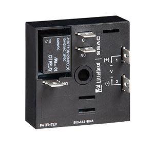 Black square relay with central hole and labeled spade terminals.