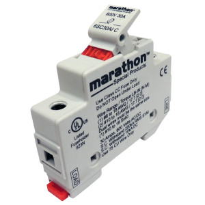 White plastic fuse holder block with printed specifications, a hinged lever and a red indicator
