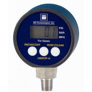 Round blue digital pressure meter with a small rectangular screen and three white buttons labeled on/unit/off, reset/clear and light, attached to a threaded metal fitting.