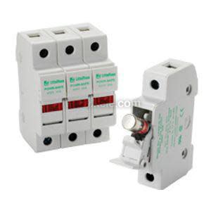 Modular fuse holder with yellow fuse carriers.