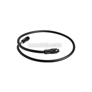 Coiled black flexible cable with connector fittings at both ends, used as an extension for inspection cameras or probes.